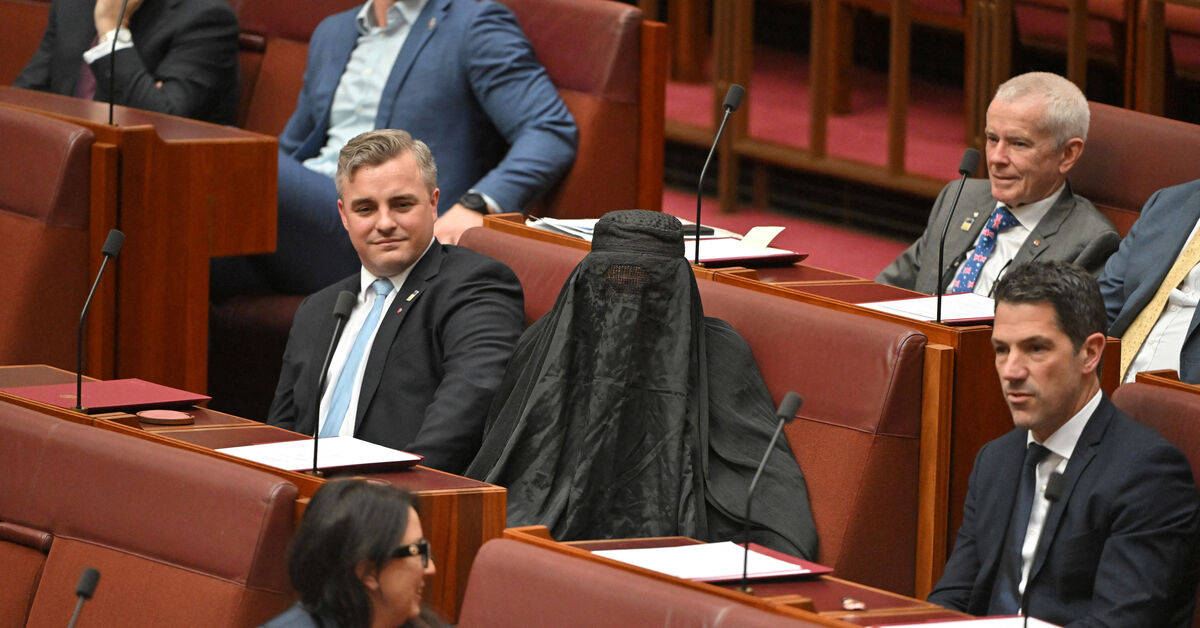 Australian far-right senator wears burqa to parliament, sparking outrage