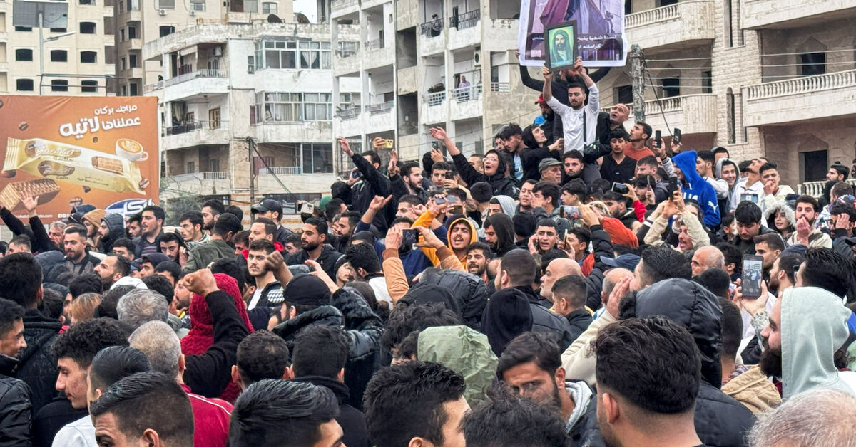 Syrian security forces use gunfire to disperse rival protests in Alawite heartland