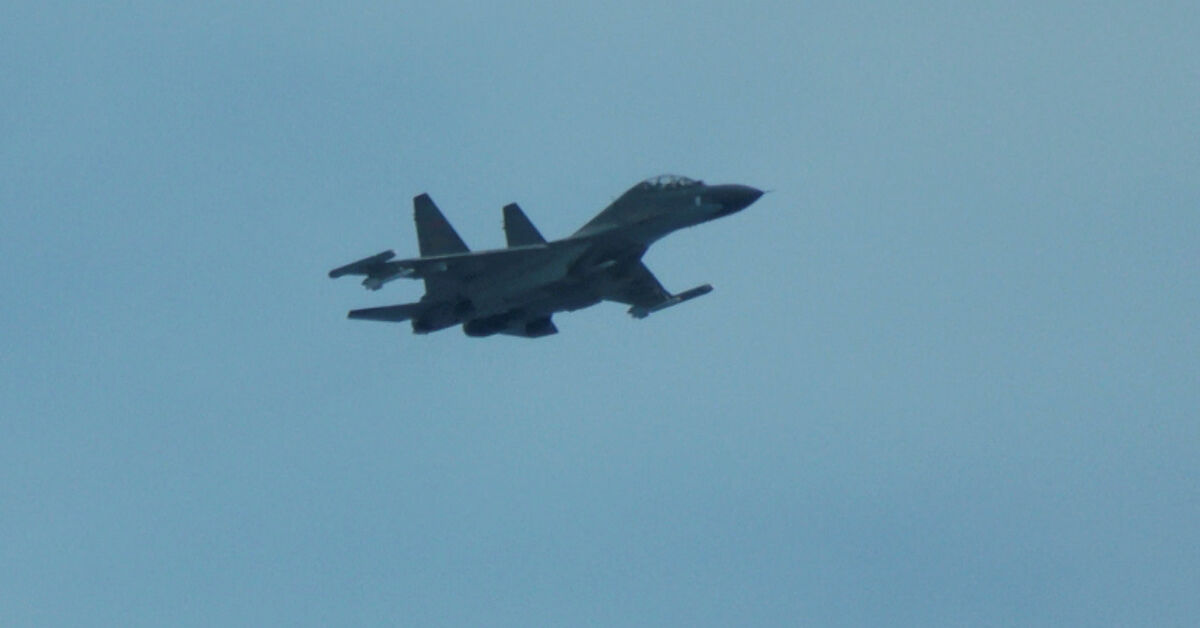 China says it expelled Philippine aircraft, vessels near disputed atolls