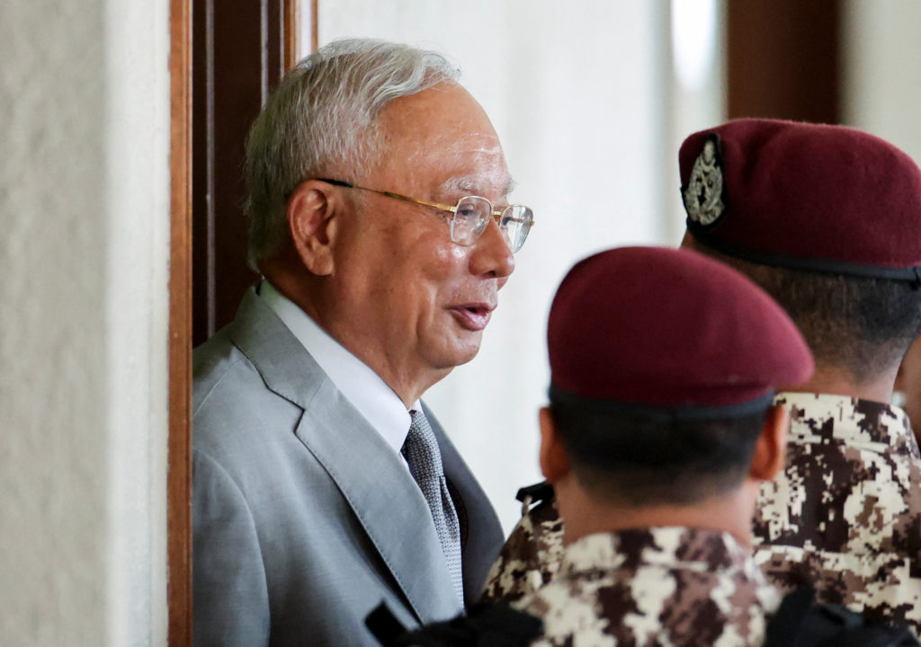 Malaysian court sentences ex-Prime Minister Razak to 15 years and big fine in corruption case