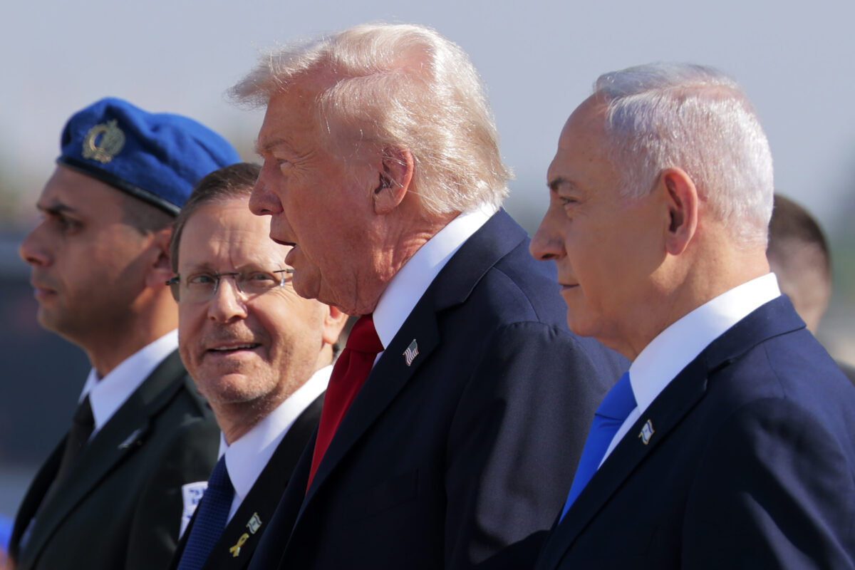 US President Donald Trump is welcomed by Israeli President Isaac Herzog and Prime Minister Benjamin Netanyahu at Ben Gurion International Airport on October 13, 2025 in Tel Aviv, Israel. [Chip Somodevilla/Getty Images]