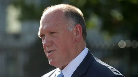 Getty Images Tom Homan speaking to reporters outside the White House on 3 September 2025. 