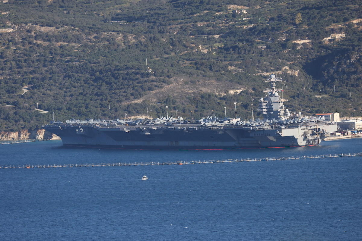 The USS Gerald R. Ford aircraft carrier docks at Souda Bay on Crete Island, Greece on February 24, 2026. [Stefanos Rapanis - Anadolu Agency]