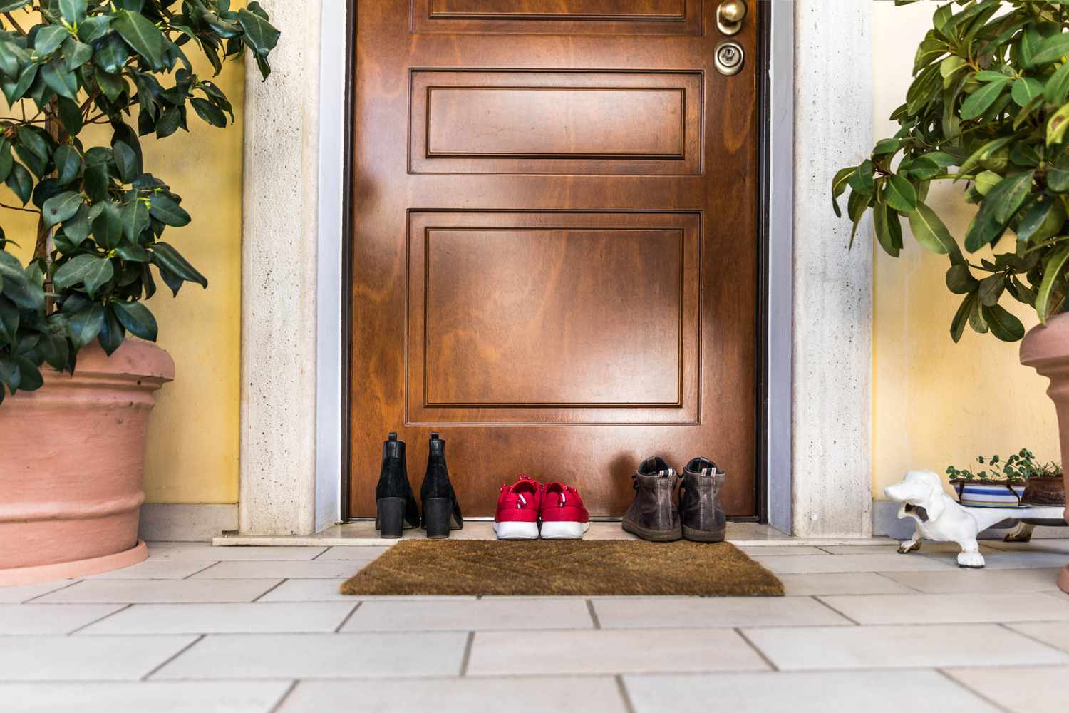 Should Guests Take Their Shoes Off in Your Home? Here’s What a Microbiologist Says