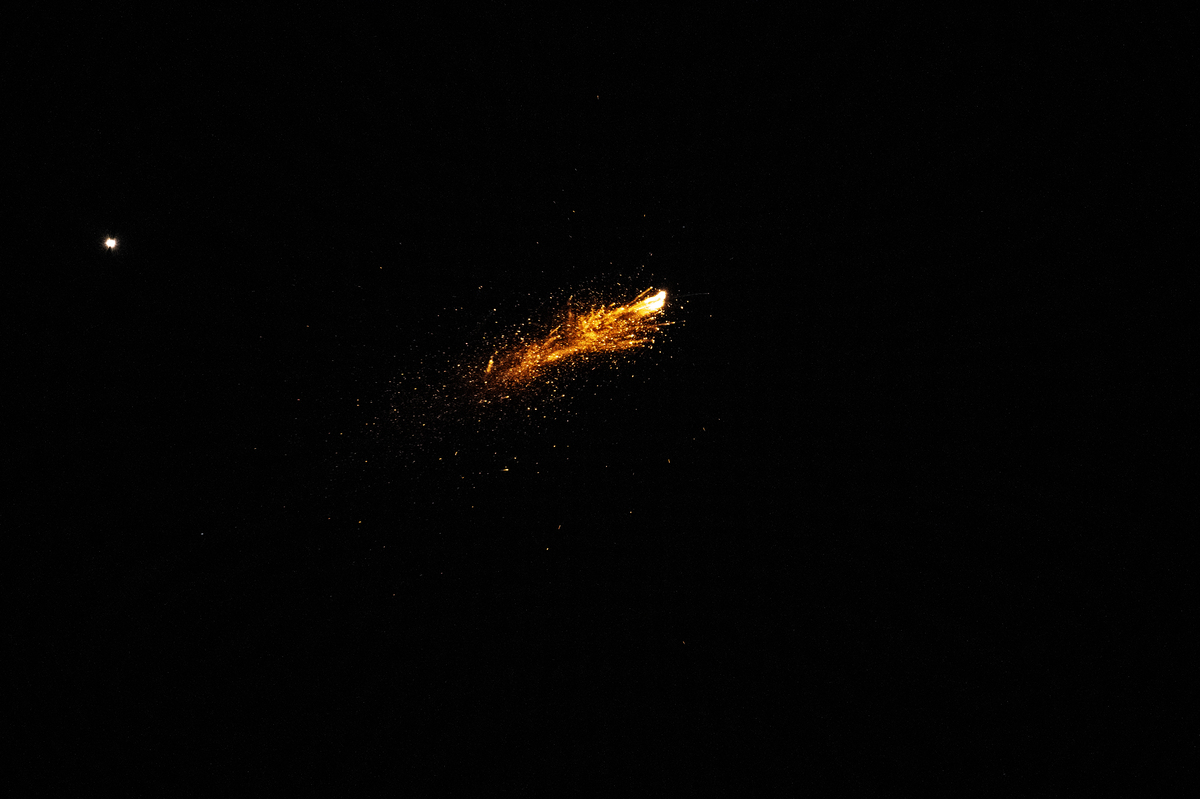 Missiles launched from Iran streak across the sky as Israeli air defense systems intercept some of them during ongoing retaliatory strikes following U.S. and Israeli attacks in Tel Aviv, Israel, on March 01, 2026. [Mostafa Alkharouf - Anadolu Agency]