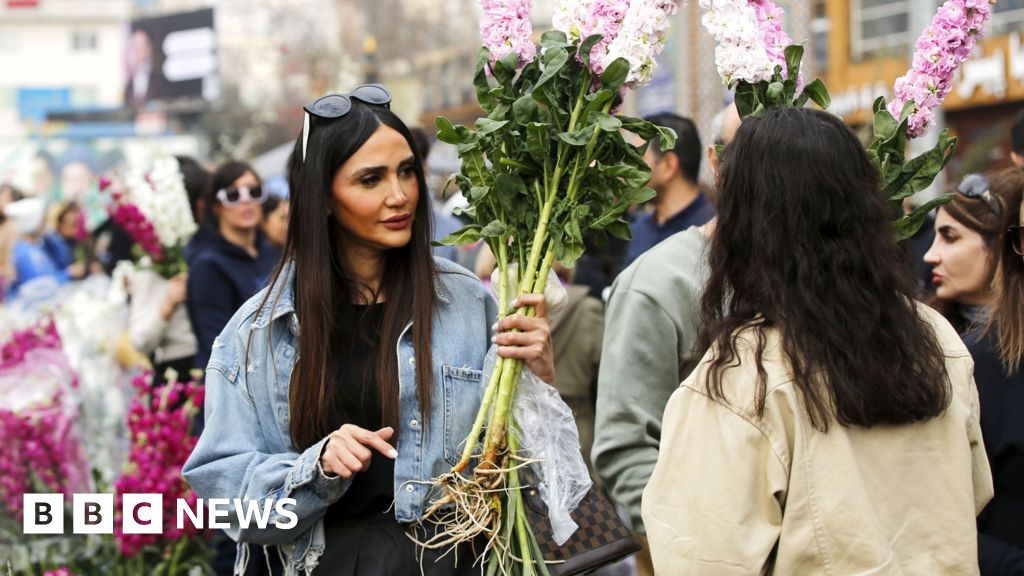 'You can't smell Nowruz in the air': Iran marks Persian new year under threat of strikes – BBC