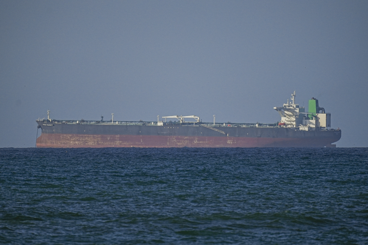 A view of the vessels passing through Strait of Hormuz following the two-week temporary ceasefire reached between the United States and Iran on the condition that the strait be reopened, seen in Oman on April 08, 2026. [Shady Alassar - Anadolu Agency]