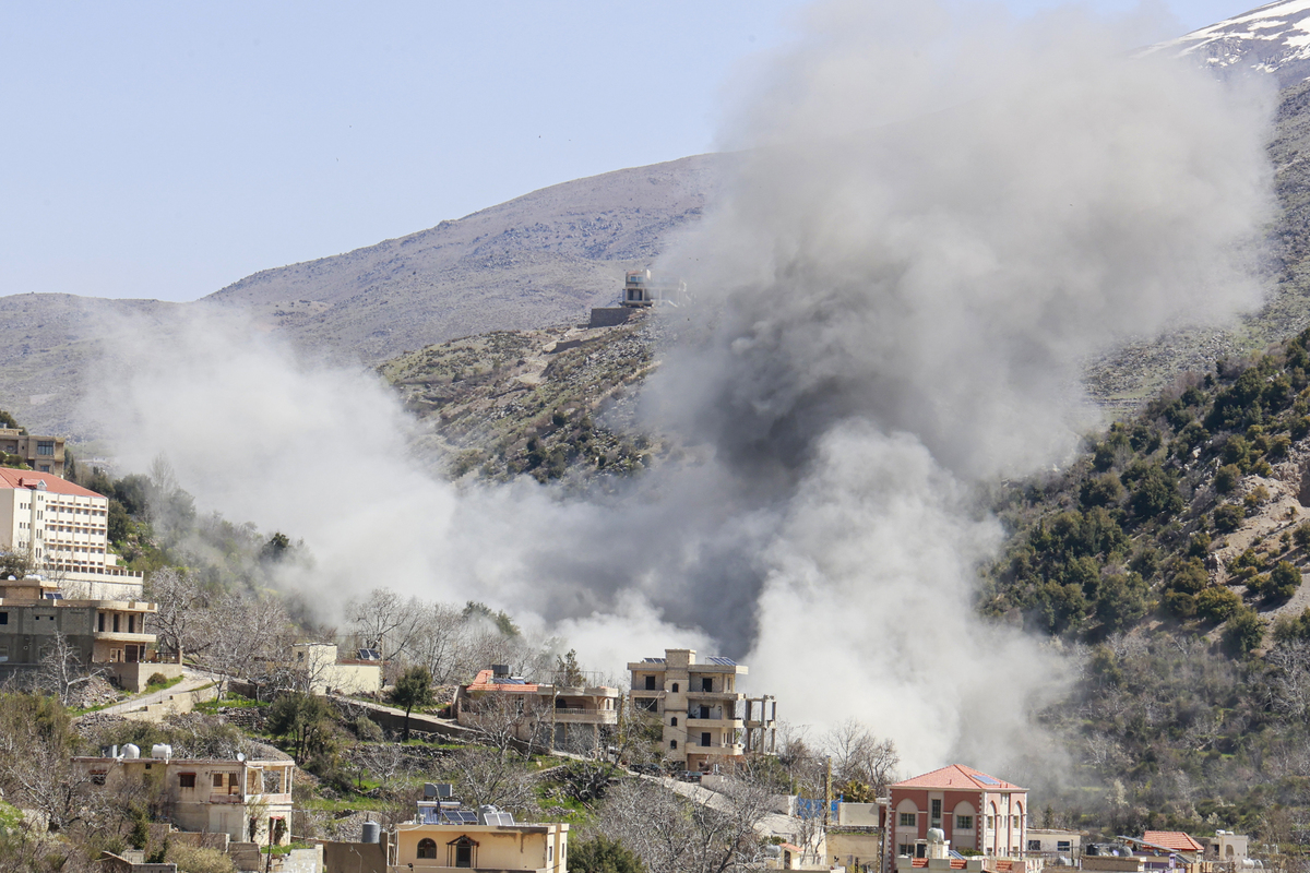 Smoke rises from targeted areas in the town of Shebaa in Lebanon’s Nabatieh province following an airstrike, on April 14, 2026. [Ramiz Dallah - Anadolu Agency]