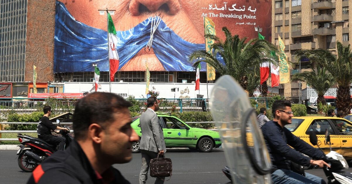 Iran warns of ceasefire violation as US plans to escort Hormuz ships
