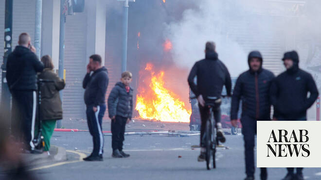 Protesters torch buildings and vehicles, block roads over Belfast stabbing